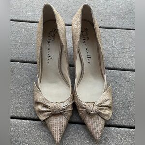 Gold Bettye Muller heels.